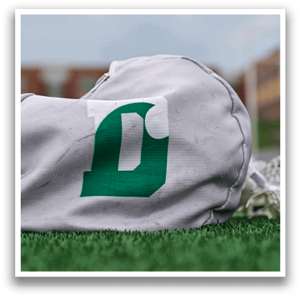 A white bag with a green letter D on it. Description generated by AI