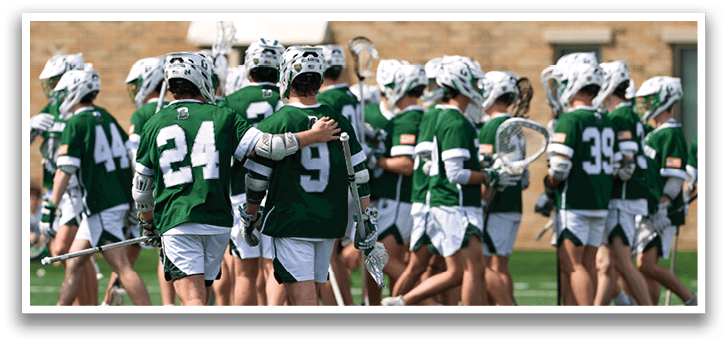 A group of people wearing green shirts and white shorts. Description generated by AI
