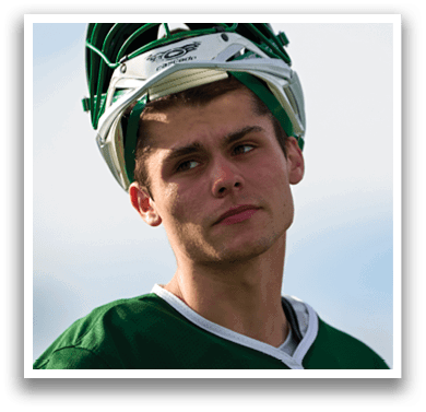 A man wearing a green shirt with a white undershirt and a green helmet. Description generated by AI