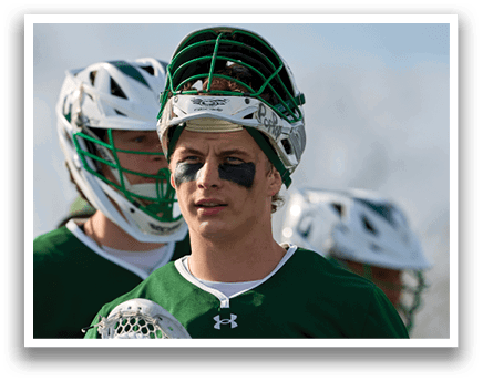 A man wearing a green shirt and a white helmet. Description generated by AI