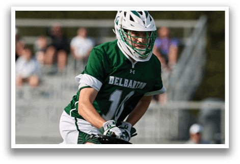A man wearing a green and white uniform with the number 11 on it. Description generated by AI