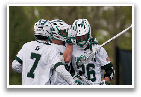 A man wearing a green and white jersey with the number 25 on it. Description generated by AI