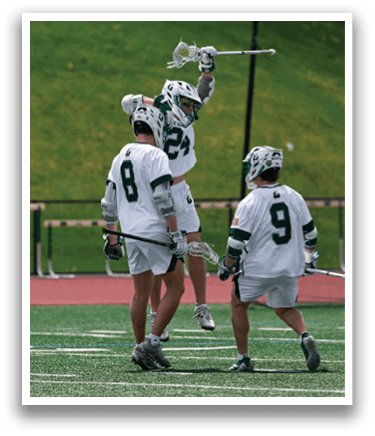 Three men wearing white uniforms and green and white helmets are playing lacrosse. Description generated by AI