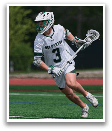 A man wearing a white jersey with the number 3 on it. Description generated by AI