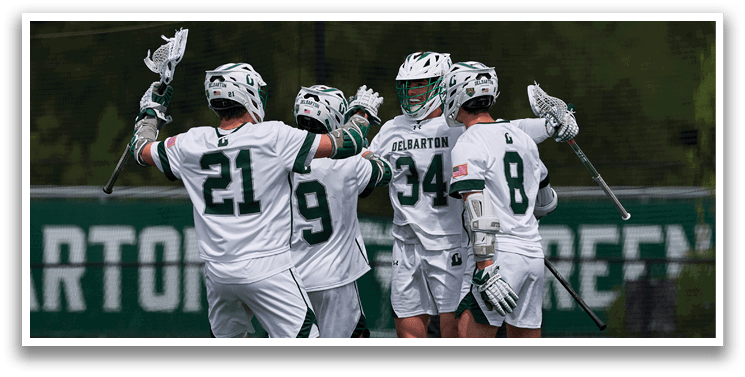 A group of men wearing white uniforms and green and white helmets are celebrating a victory. Description generated by AI