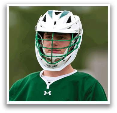A man wearing a green and white helmet. Description generated by AI