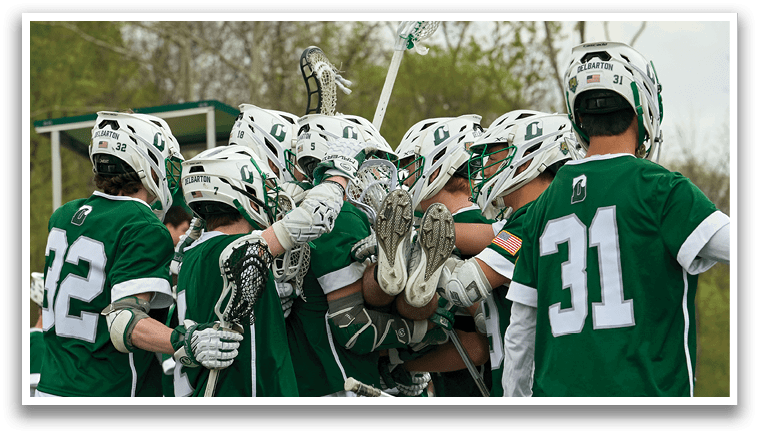 A group of men wearing green and white uniforms. Description generated by AI