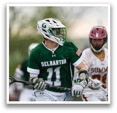 A man wearing a green jersey with the number 11 on it. Description generated by AI