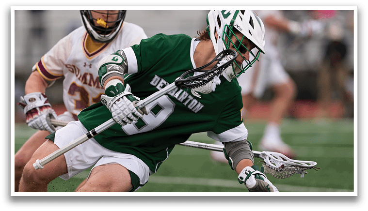 A man in a green shirt is diving on the ground. Description generated by AI