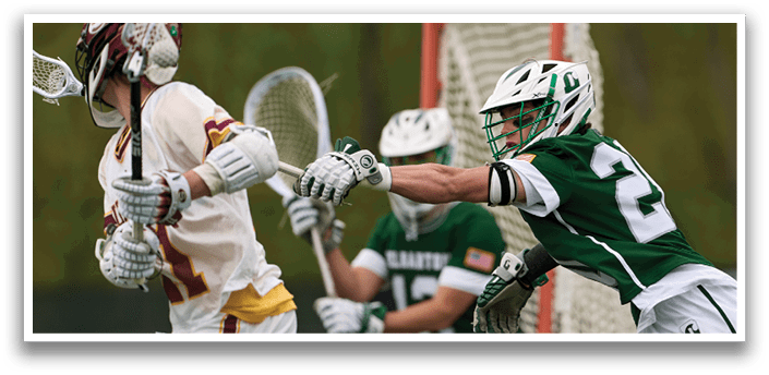 A man wearing a green shirt and white shorts is trying to catch a ball. Description generated by AI