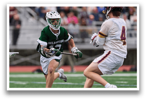 A man in a green shirt and white shorts is running on a field. Description generated by AI