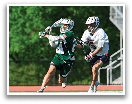A man in a green shirt is running with a lacrosse stick. Description generated by AI