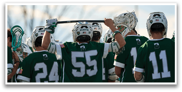 A group of people wearing green jerseys. Description generated by AI