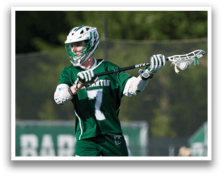 A man wearing a green and white jersey with the number 7 on it. Description generated by AI