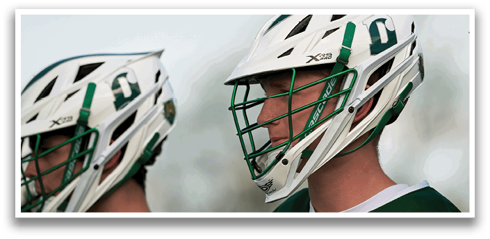 Three people wearing green and white helmets. Description generated by AI