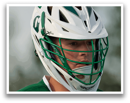 A man wearing a green and white helmet. Description generated by AI