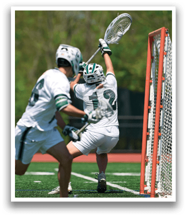 A man in a white uniform is trying to score a goal. Description generated by AI