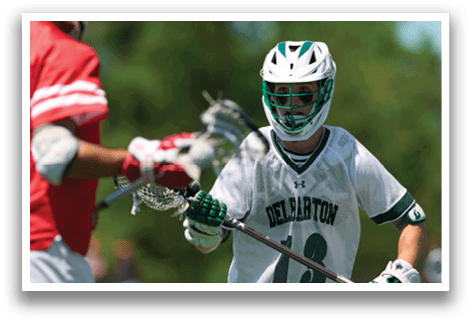 A man wearing a white jersey with the number 13 on it. Description generated by AI
