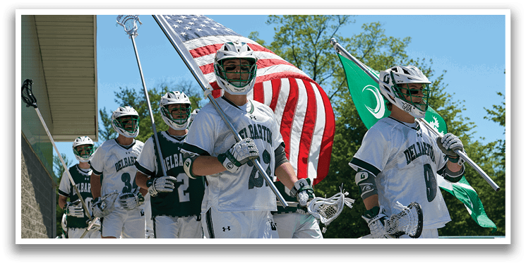 A group of lacrosse players holding flags. Description generated by AI