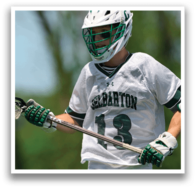 A man wearing a white jersey with the number 13 on it. Description generated by AI