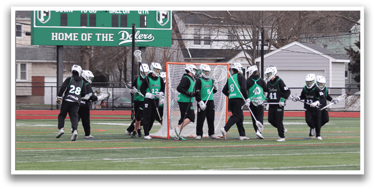 A group of people are playing a game of lacrosse on a field. AI generated content