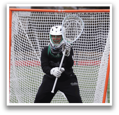 A person wearing a baseball glove is standing in front of a net. AI generated content