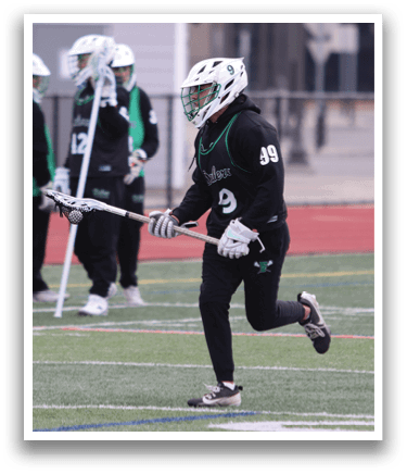 A group of people wearing green and black uniforms are playing a game of lacrosse. AI generated content