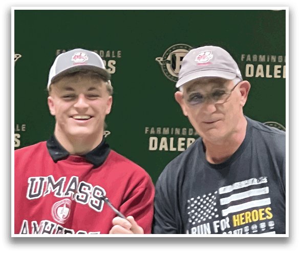 Two men are standing in front of a green backdrop, one of them holding a pen. AI generated content