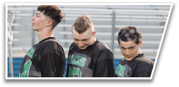 A group of young men wearing black jerseys with the number 32 on them. Description generated by AI