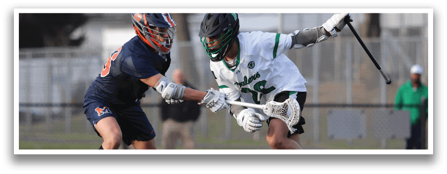 A man in a blue shirt and orange shorts is running on a field. Description generated by AI