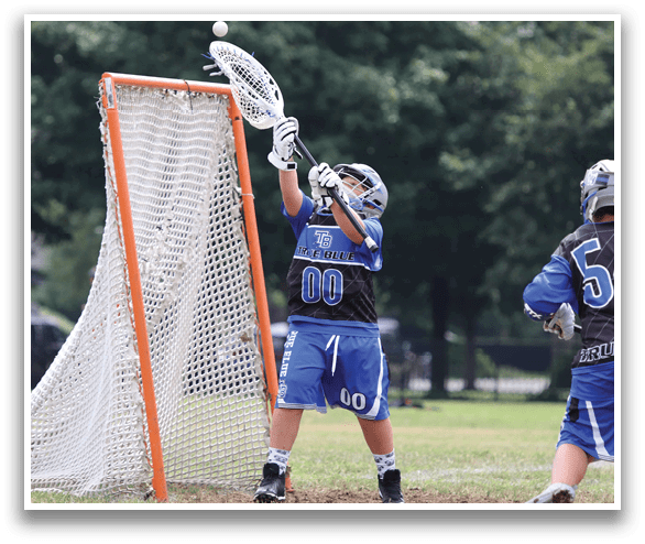 Two people playing a game of lacrosse, one of them is trying to catch a ball. AI generated content