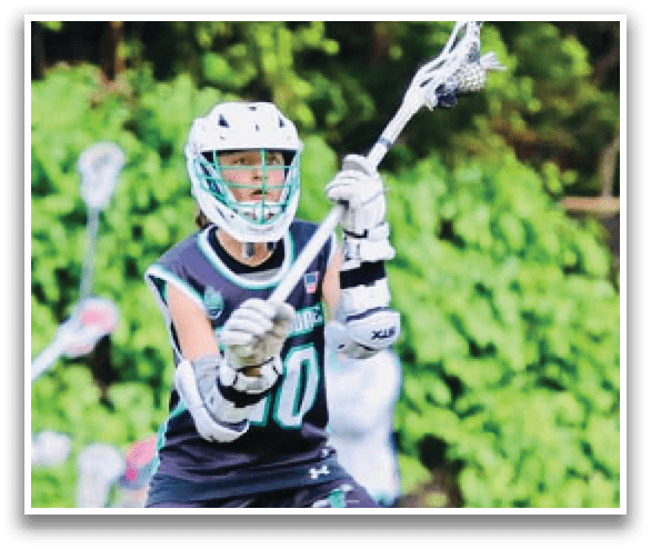 A man in a black and white uniform is holding a lacrosse stick, ready to play. AI generated content