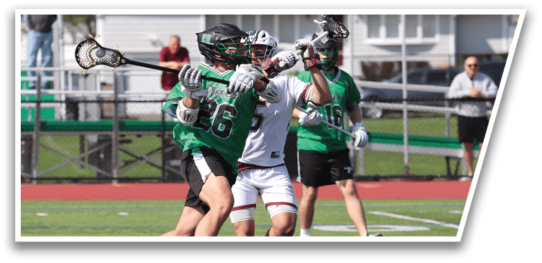 A group of people playing a game of lacrosse on a field. Description generated by AI