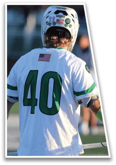 A man wearing a white jersey with the number 140 on the back. Description generated by AI