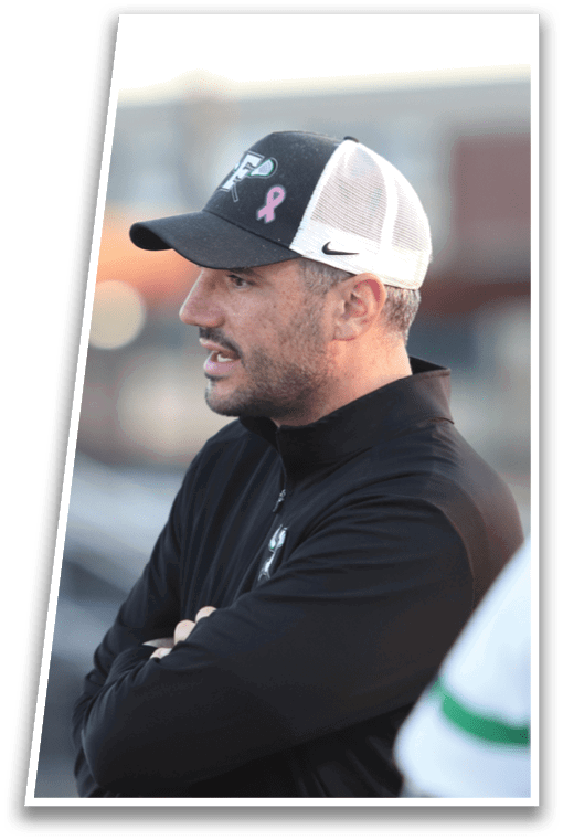 A man wearing a black shirt and a white hat. Description generated by AI
