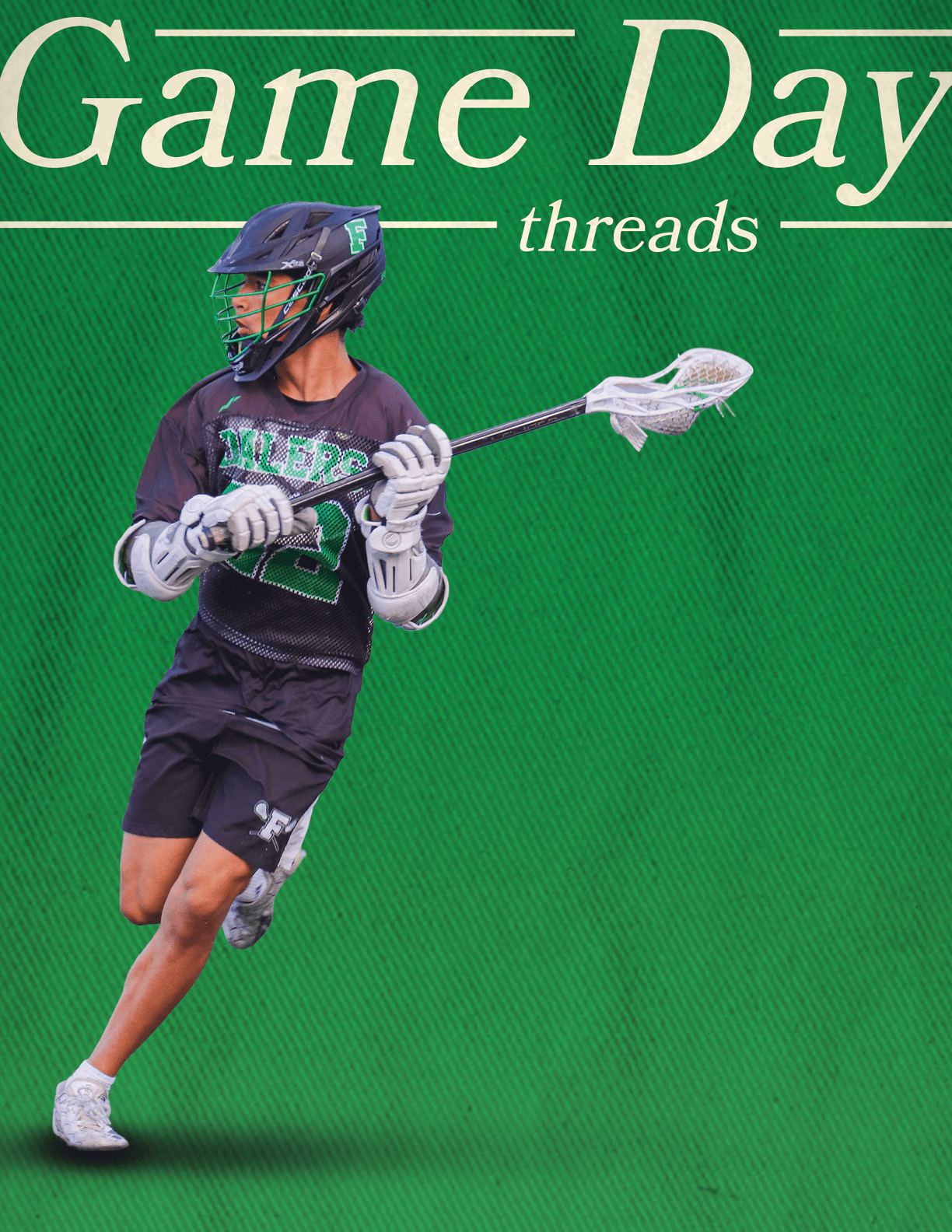 A man wearing a black shirt and white shorts is holding a lacrosse stick. Description generated by AI