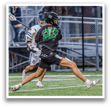 A man in a green jersey is swinging a lacrosse stick, attempting to hit a sports ball. AI generated content