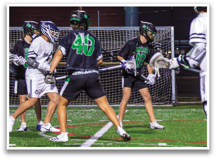 A group of people playing a game of lacrosse on a field. AI generated content