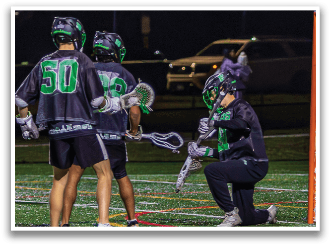 Three people playing lacrosse on a field. AI generated content