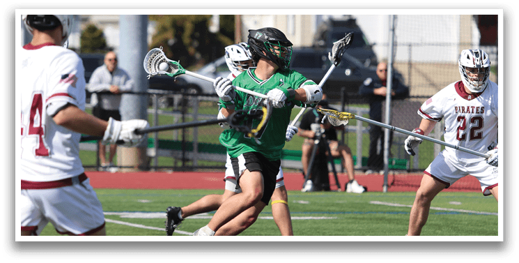 A man in a green shirt and black shorts is running with a lacrosse stick. Description generated by AI