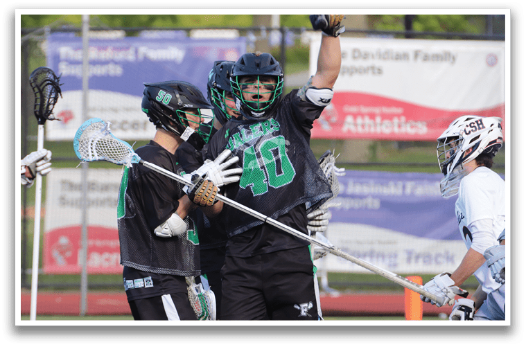 A group of people playing lacrosse. Description generated by AI