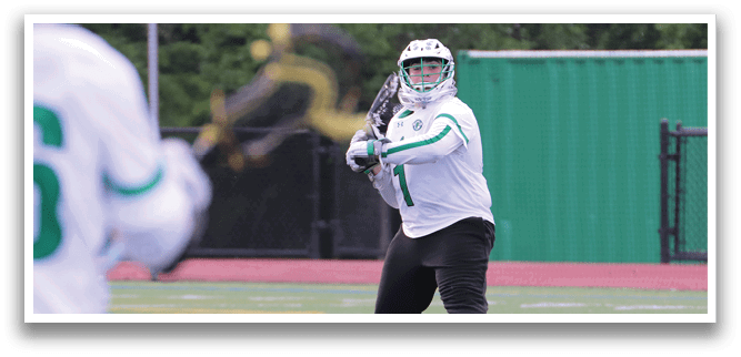 A man in a red and white uniform is playing lacrosse. Description generated by AI