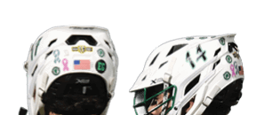 A man wearing a white jersey with the number 26 on it. Description generated by AI