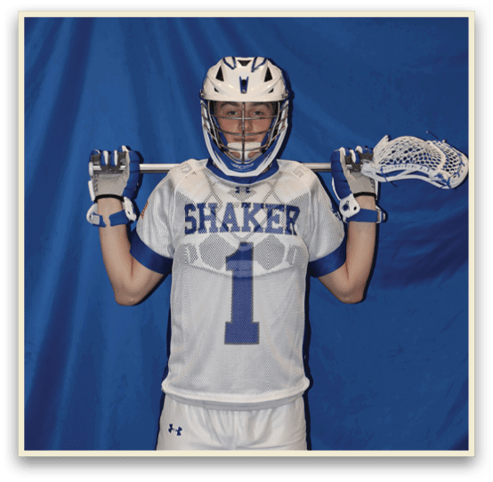 A man wearing a white jersey with the number 1 on it holds two lacrosse sticks. AI generated content