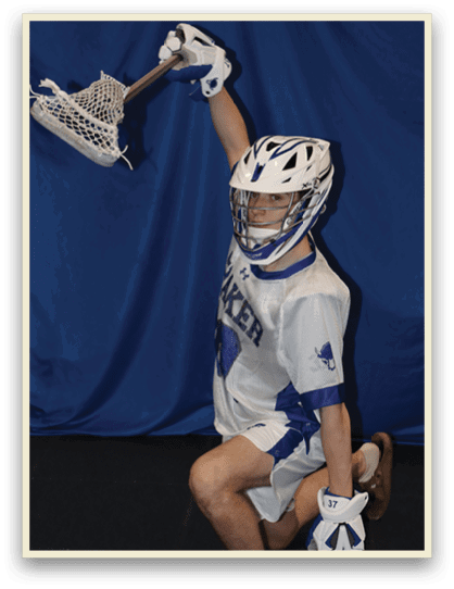 A man is lying on the ground holding a lacrosse stick. AI generated content