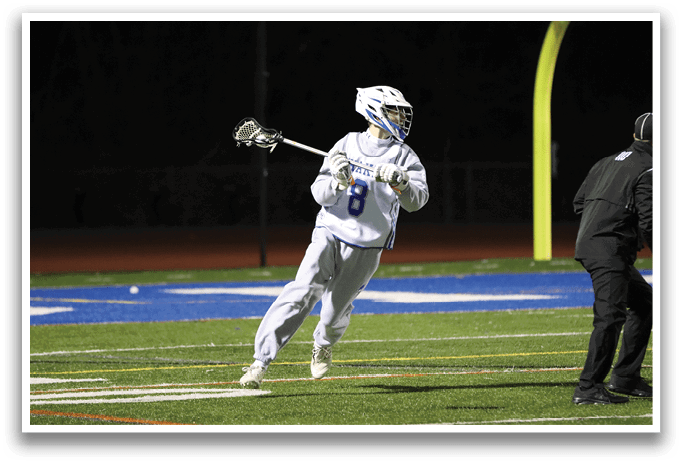 A man wearing a white uniform is holding a lacrosse stick and running on a field. AI generated content