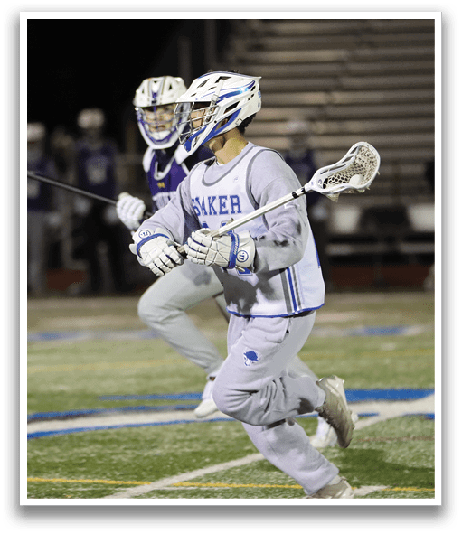 Two men playing lacrosse on a field. AI generated content