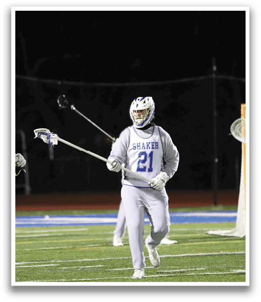 A group of people playing lacrosse on a field. AI generated content