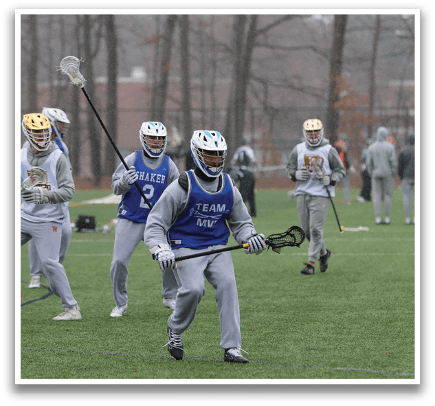 A group of people playing lacrosse on a field. AI generated content