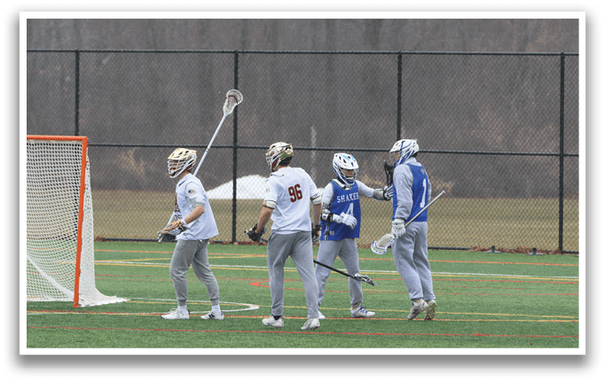 A group of men playing a game of lacrosse on a field. AI generated content
